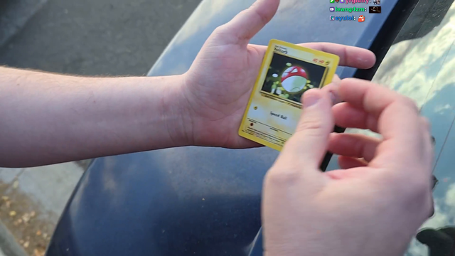 fan pulls $10k holo Dark Charizard on the street with FaZe Adapt and YourRAGE