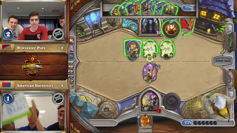 American University Hearthstone team holds up "Free Hong Kong, boycott Blizzard" sign during Collegiate Hearthstone Championship. Blizzard quickly cuts their broadcast.