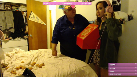 5 Cities Charity who Maya raised 30k for brings Maya a cake.