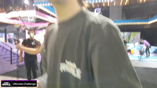 Adept stands next to T1