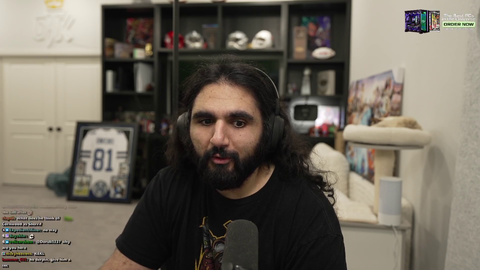 Esfand shows Final Fantasy 7 Rebirth Game Director Naoki Hamaguchi his cosplay
