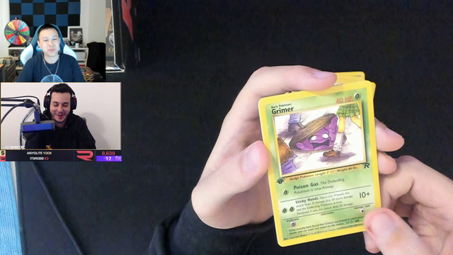 Ramee pulls Dark Charizard Holo