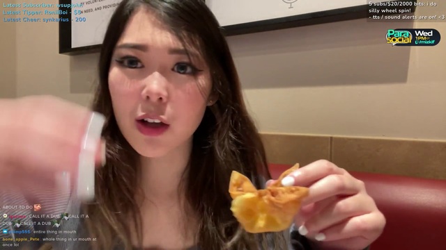 ExtraEmily shows how to correctly eat Crab Rangoons.