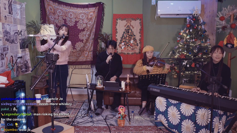 The spirit of Louis Armstrong visits Jo for Chrismas duet
