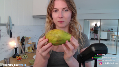Streamer eats papaya with peel