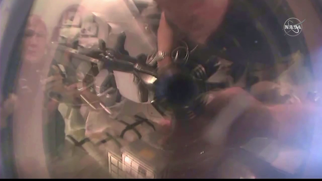 Taking a look out of a spaceship's window