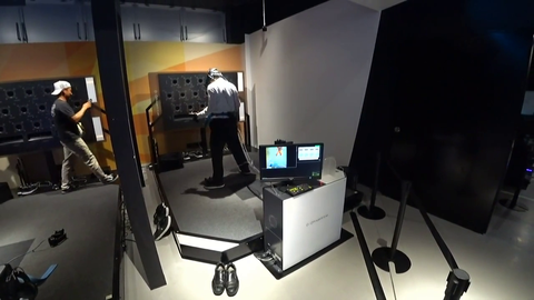 Japanese guy getting the full experience of VR