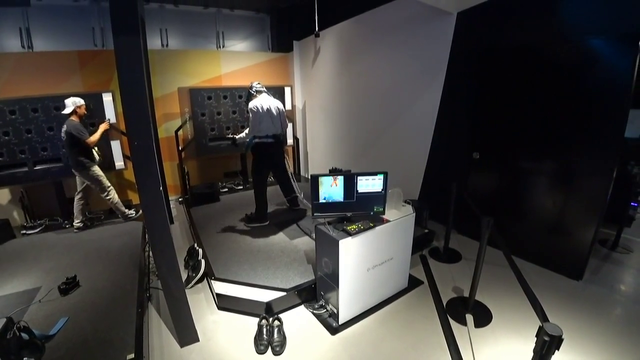 Japanese guy getting the full experience of VR