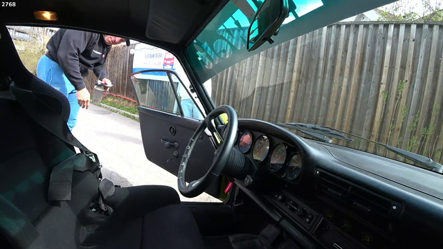 Big man knut trys to get in a small car