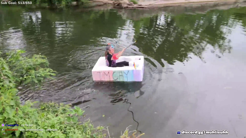 Crazy employee at iron forge risks her life to go down a river in a styrofoam boat