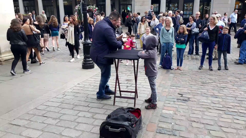 Street Performer shows us how to make a woman smile