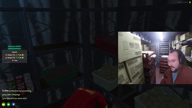 fast food worker takes a break in the freezer