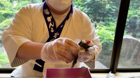 Scarra tries to eat rice paper through mask