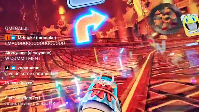 Darius plays Mario Kart arcade while holding a selfie stick