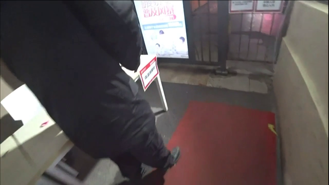Eloise finesses through a checkpoint security guard asking for her ID.