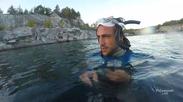 Small boy takes his first swim