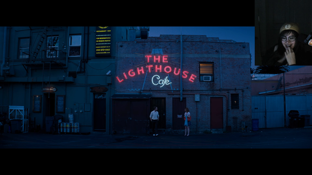 Gigi casually watching the full movie "La La Land" on stream.