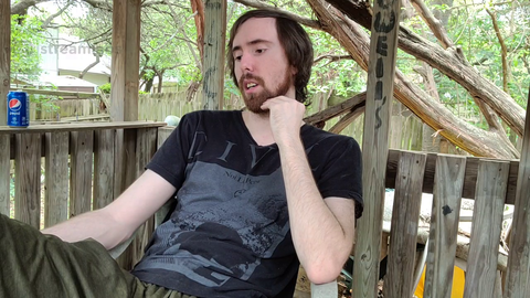 Asmongold getting laughed at by a squirrel