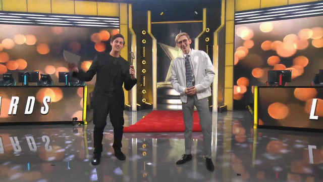 LEC caster accepts an award