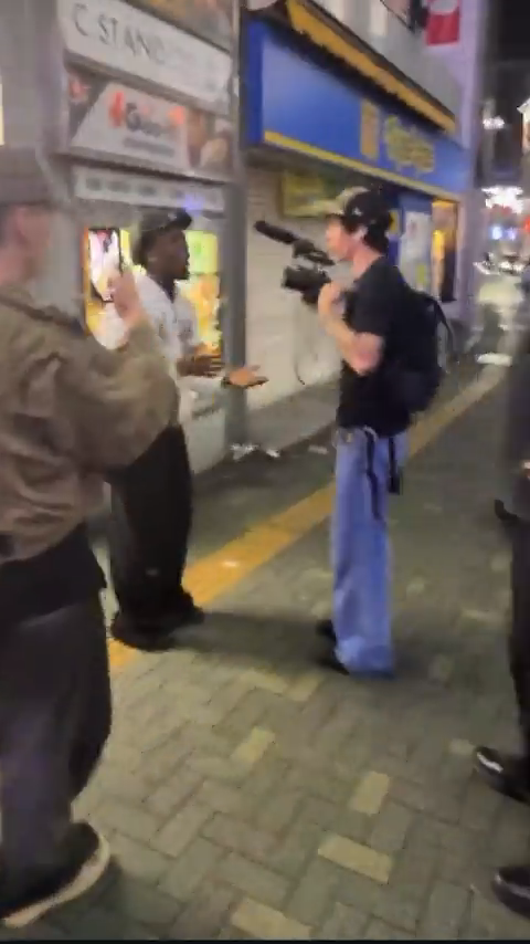 Kai arguing with his camera man in Japan