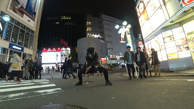 Joey doing backflip in Shibuya