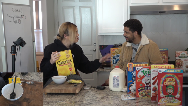 malena hits her boyfriend with a cardboard box