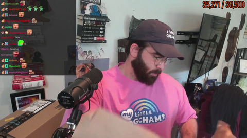 Hasan receives Cleanbois poster from a viewer