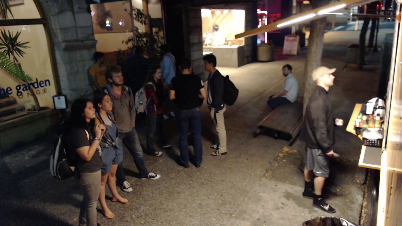 Two college guys fight outside food truck