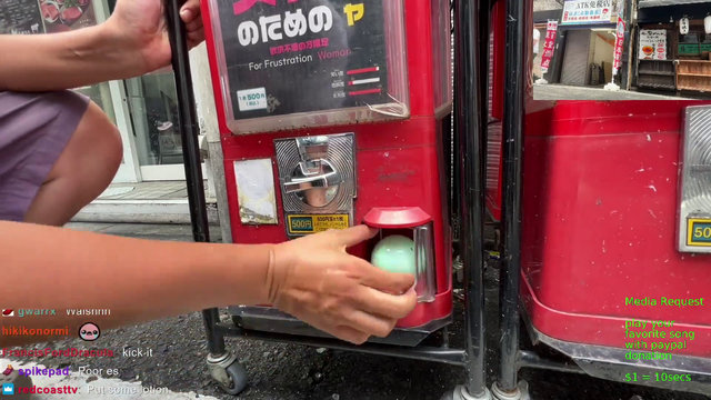 awkwardly gets thong from a coin machine