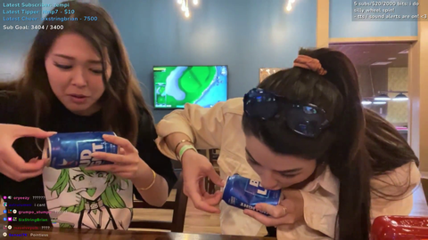 Emily and Caroline shot gunning a beer can KKonaW