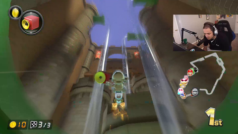 Erobb participates in a Mario Kart tournament