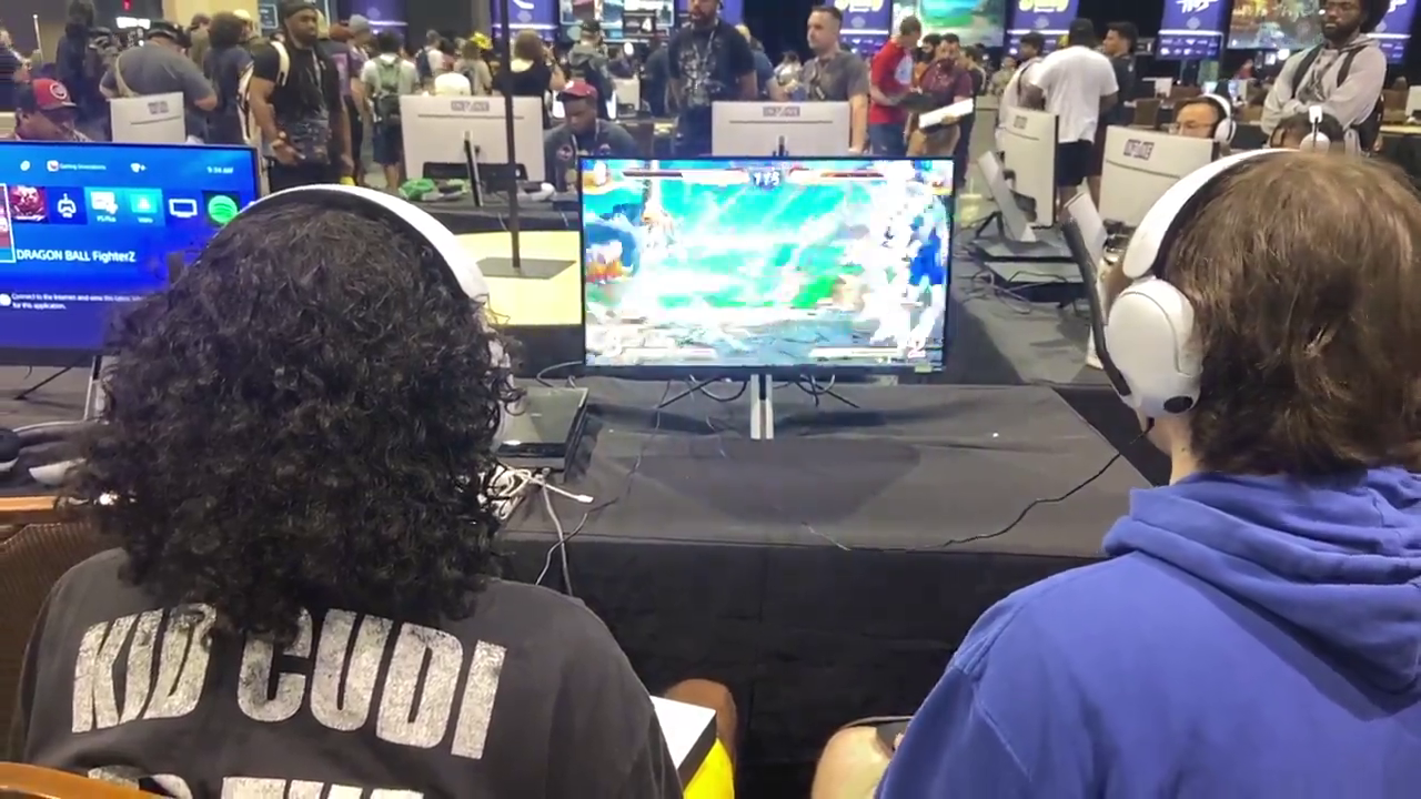Guy assaults someone after getting eliminated in a fighting game tournament