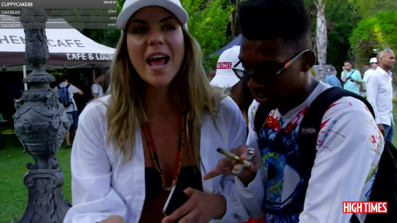Black talks to a model at the High Times mansion