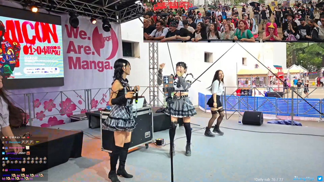 Jinny and Tanuki on stage at Comicon