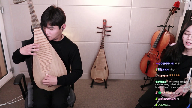 Guy plays the pipa