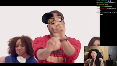 Caroline shows a hiphop music video she was in early in her career