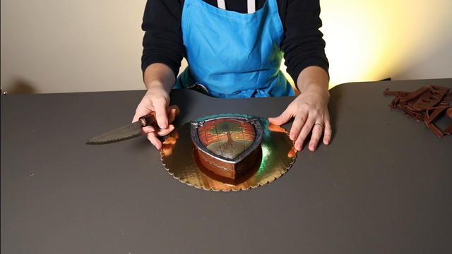 Cake streamer bisects Ser Duncan's shield from Game of Thrones' Knight of the Seven Kingdoms