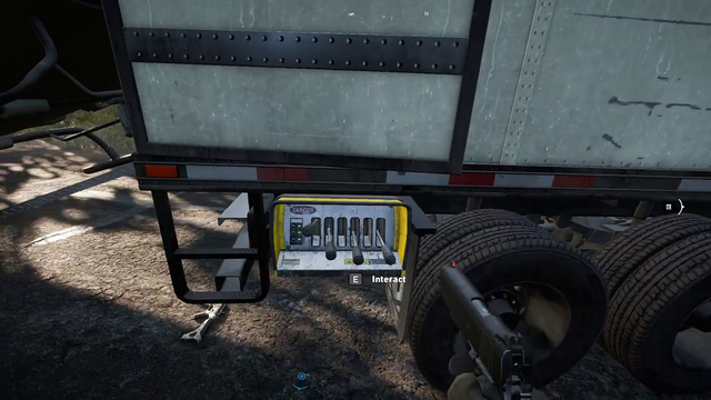 Jerma loads a helicopter into the back of an 8-wheeler.
