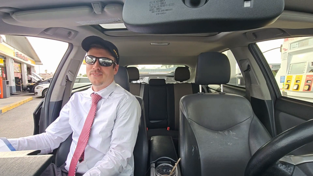 based driving instructor talks to a based passerby
