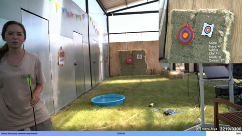 Maya tries archery