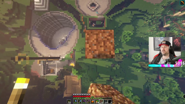 Sips shows his son his Minecraft world