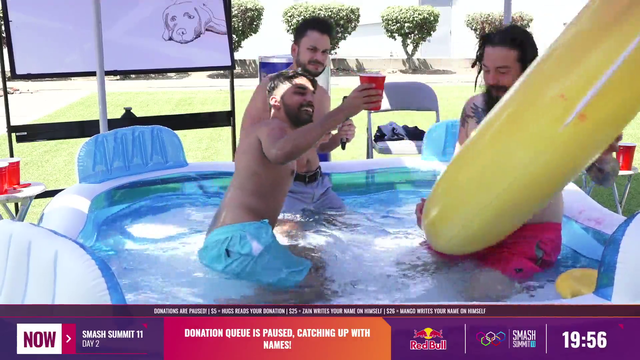 Zain waterboards Mango with beer in a hot tub