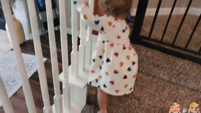 Emmy learns how to use the stairs