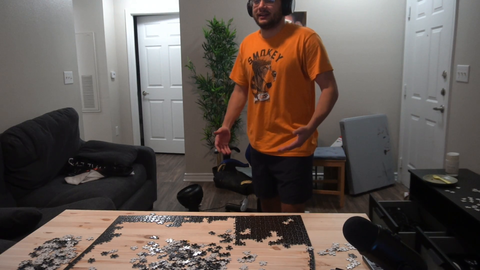 Erobb resets his 1000 piece all black puzzle after being caught cheating