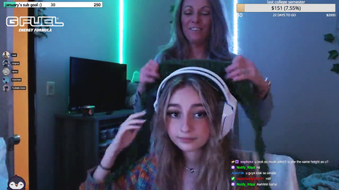 Mom tries on her daughters bunny ears.