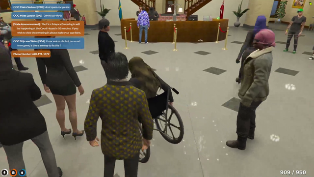 Dice guy helping someone in a wheelchair