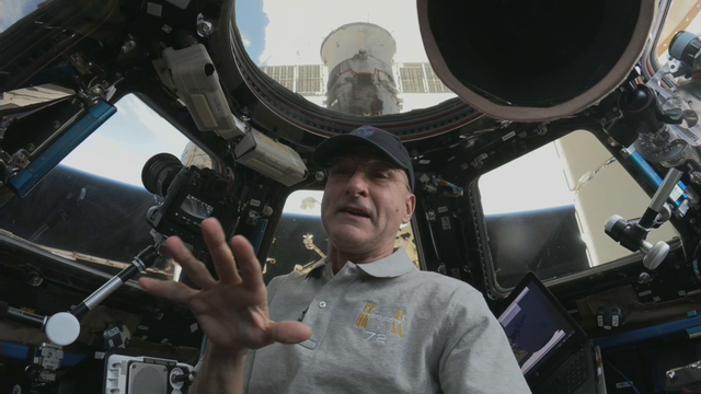 Astronaut Don Pettit does a microgravity experiment on NASA's first twitch stream live from space