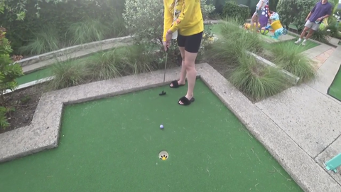 Adept tries to make a putt