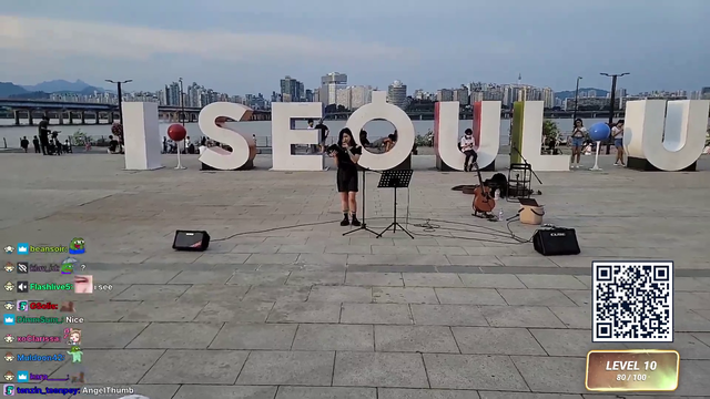 Crowd goes wild during Hachu's busking performance