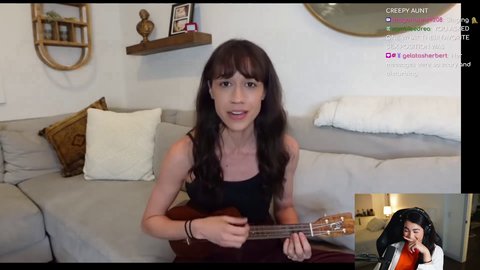 Caroline singing along with the apology video